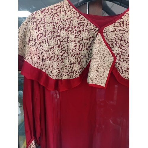 216 - A 1920's burgundy Chiffon dress with lace work A/F (rip to front lower half)