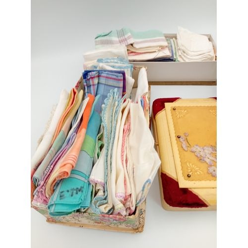 217 - A large quantity of vintage linen handkerchiefs from the 1930,s / 1940's. APX 70