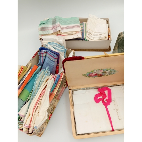 217 - A large quantity of vintage linen handkerchiefs from the 1930,s / 1940's. APX 70