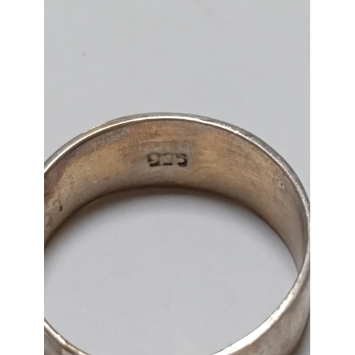 364 - A trio of silver rings. Two are stamped 925.