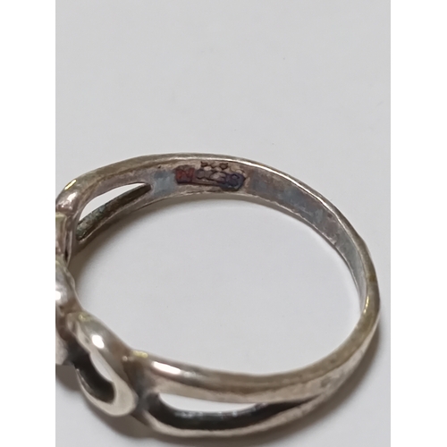 364 - A trio of silver rings. Two are stamped 925.