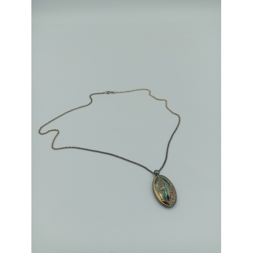 368 - A 'Brooks & Bentley'.925 stamped chain with a stamped .925 dolphin pendant.