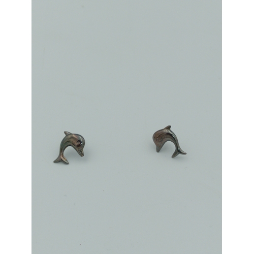 373 - A stamped 925 silver dolphin pendant on a chain and dolphin earrings set.