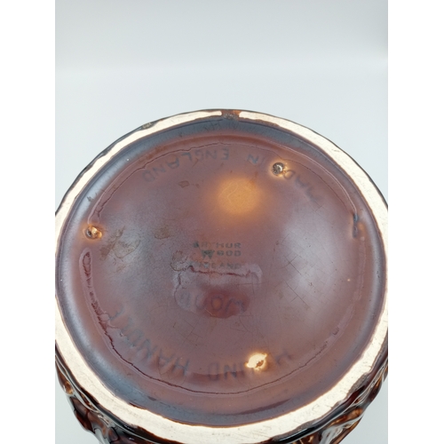 2 - A large ceramic brown jug. Made in England by 'Arthur Wood'