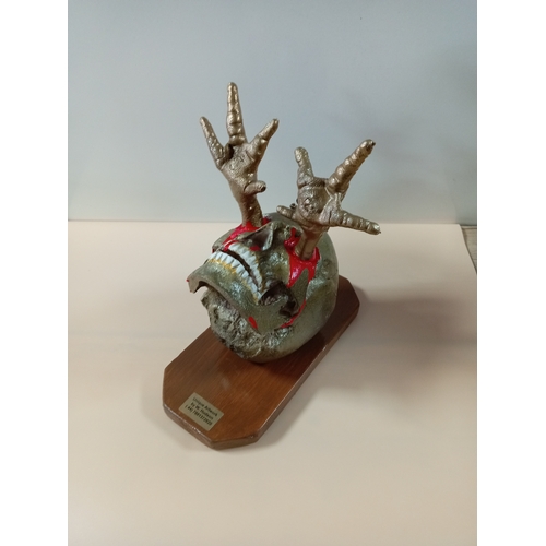 5 - A unique wall art by W.Hudson. Featuring a skull on a wooden frame with chicken legs sticking out of... 