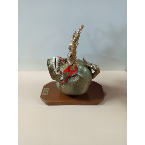 5 - A unique wall art by W.Hudson. Featuring a skull on a wooden frame with chicken legs sticking out of... 