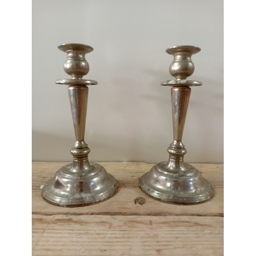 12 - A pair of H.Samuel candle sticks. (H 24cm)