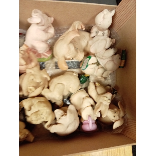 15 - A job lot of 25 handmade ceramic pigs mostly 'Piggin' by David Corbridge. 1990s.