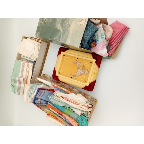 217 - A large quantity of vintage linen handkerchiefs from the 1930,s / 1940's. APX 70
