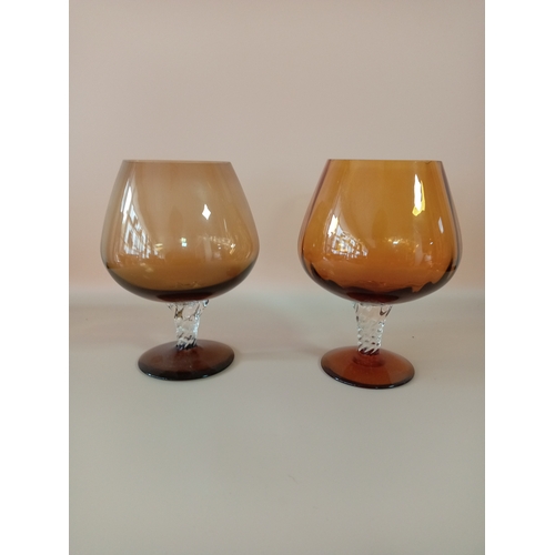 17 - Amber glass set, containing 2 goblets, 2 bowls, vase, and a jug