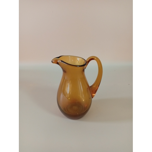 17 - Amber glass set, containing 2 goblets, 2 bowls, vase, and a jug