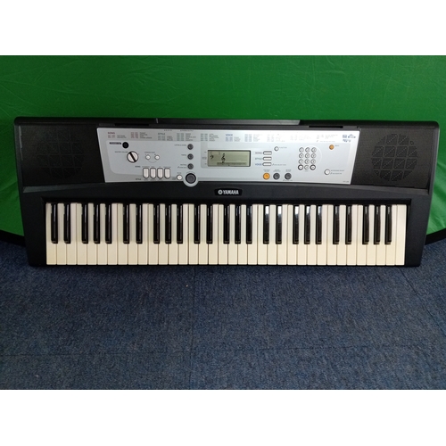28 - Yamaha Electric keyboard YPT200 with stand, book attachment, plug and manual