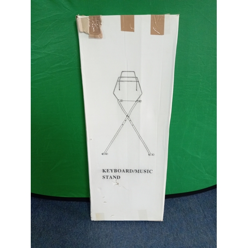 28 - Yamaha Electric keyboard YPT200 with stand, book attachment, plug and manual