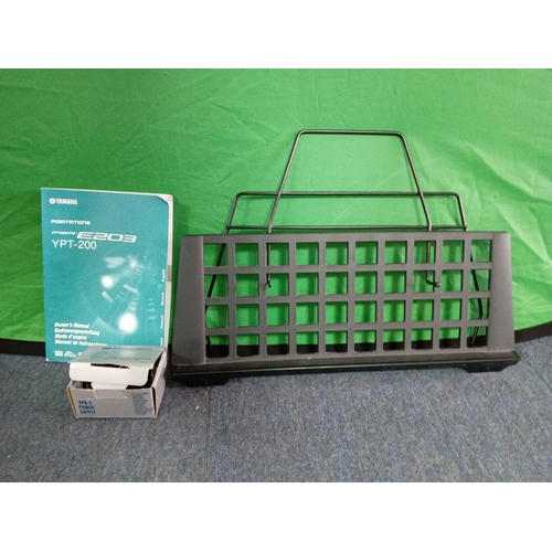 28 - Yamaha Electric keyboard YPT200 with stand, book attachment, plug and manual