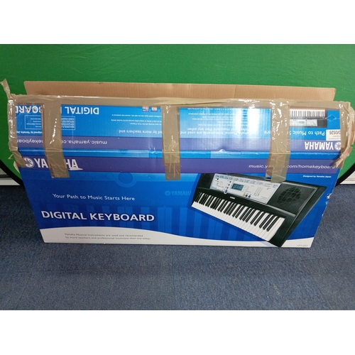 28 - Yamaha Electric keyboard YPT200 with stand, book attachment, plug and manual