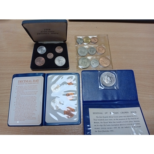 351 - A collection of uncirculated decimal and new pence coins in sleeves and cases.