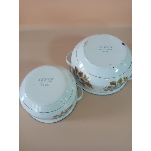 33 - 3 80's enamel wear pots, 2 white and blue New Co pots with a flower pattern (1 20cm, 1 16cm) and 1 y... 