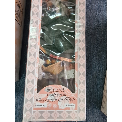 40 - A collection of 6 Leonardo Collection Porcelain Dolls in original boxes. Included are: Amanda; John;... 