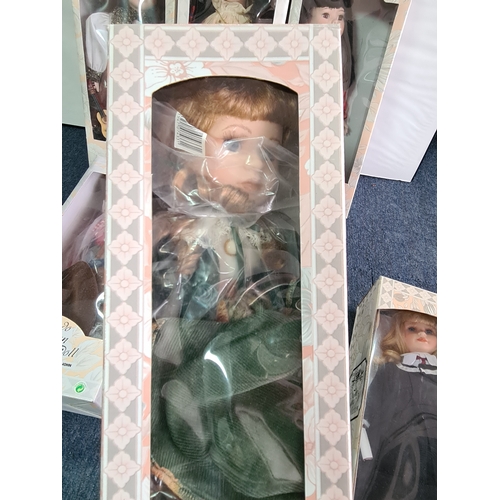 40 - A collection of 6 Leonardo Collection Porcelain Dolls in original boxes. Included are: Amanda; John;... 