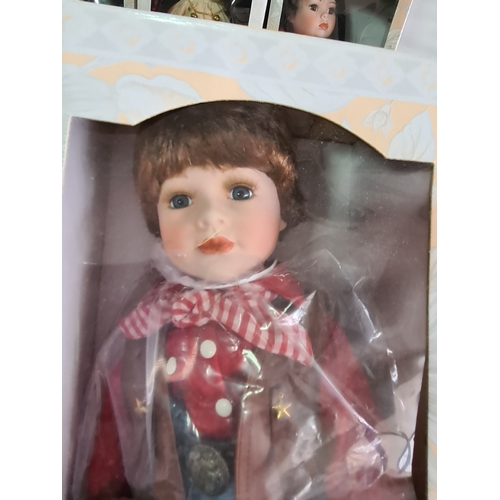 40 - A collection of 6 Leonardo Collection Porcelain Dolls in original boxes. Included are: Amanda; John;... 