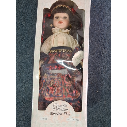 40 - A collection of 6 Leonardo Collection Porcelain Dolls in original boxes. Included are: Amanda; John;... 