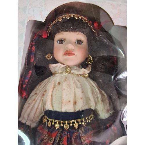 40 - A collection of 6 Leonardo Collection Porcelain Dolls in original boxes. Included are: Amanda; John;... 