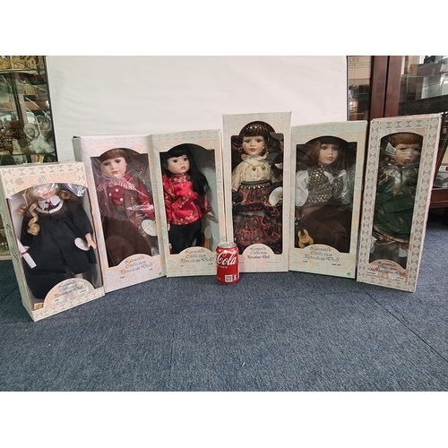 40 - A collection of 6 Leonardo Collection Porcelain Dolls in original boxes. Included are: Amanda; John;... 