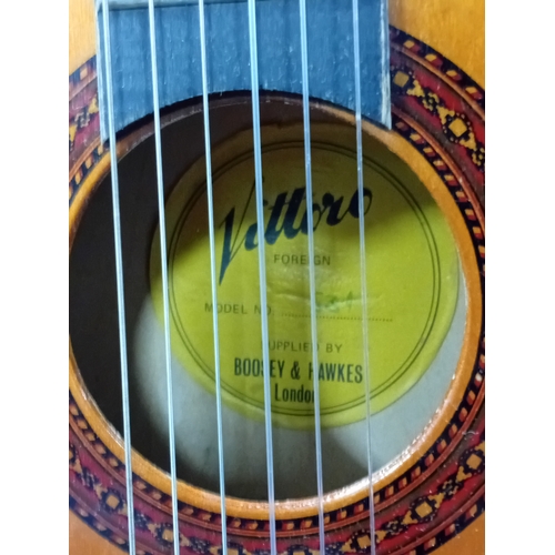 46 - A Vittoro acoustic guitar with carry case.