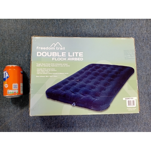 47 - A Double Lite Flock Airbed in original box.