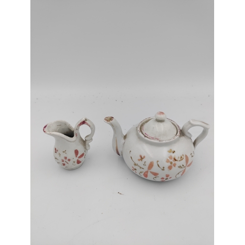 55 - Miniature Victorian ceramic tea set with floral patterns - including miniature spoons, 6 tea cups, 1... 