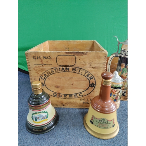 57 - General job lot including German steins, wade jugs, bells whisky bottles (empty), wooden storage