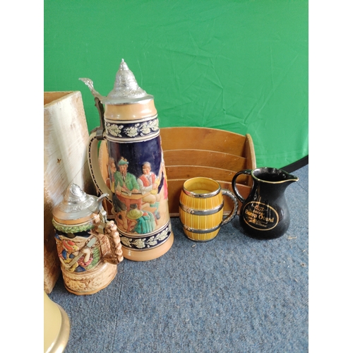 57 - General job lot including German steins, wade jugs, bells whisky bottles (empty), wooden storage