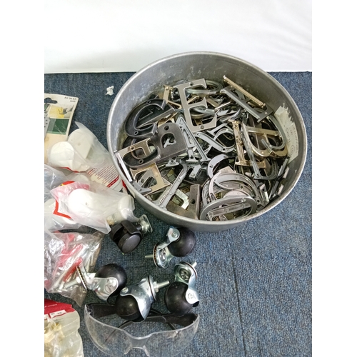 58 - A mixed collection of door letters, a small storage box, a pair of safety glasses, picture hooks, a ... 