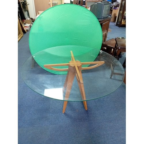 A glass topped dining table with wooden base 46 inches diameter 28 ...