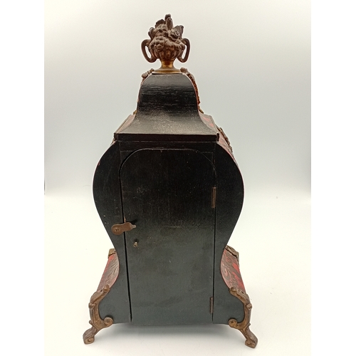 An antique victorian French tortoise shell boule mantel clock with ...