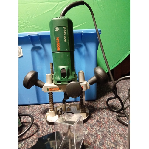 5 - A pair of plunge routers. To include a bosch, a performance power, instructions, router bits, etc...