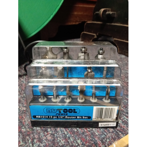 5 - A pair of plunge routers. To include a bosch, a performance power, instructions, router bits, etc...