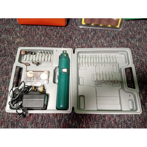 6 - A rotary tool kit with various attachments.