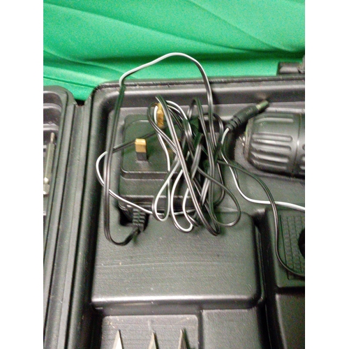 16 - A cougar cordless drill set.