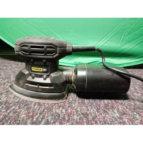 21 - A working power it! Palm sander with box & instructions.