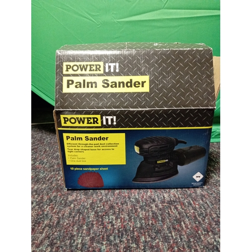 21 - A working power it! Palm sander with box & instructions.