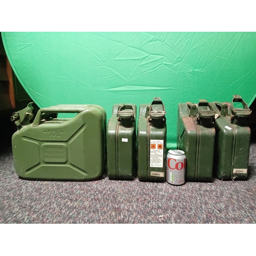 26 - A collection of vintage metal Jerry cans. To include 4 5 litre cans & 1 10 litre can.