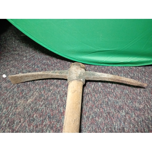 27 - A large wooden handled wood splitting axe & a large wooden handled pickaxe.