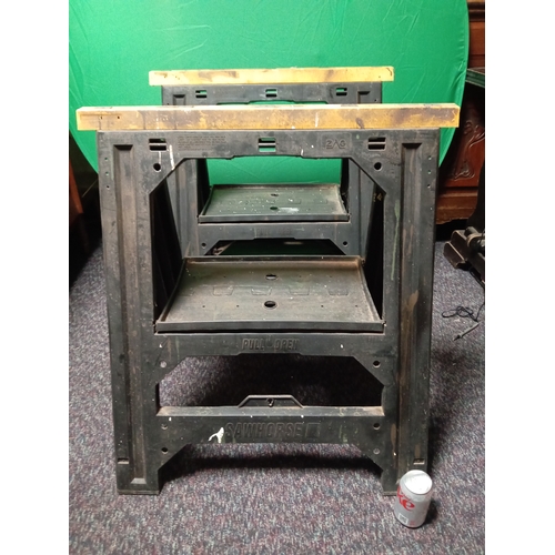 41 - A pair of plastic saw horses. (H 77 cm x W 52 cm x D 69 cm)