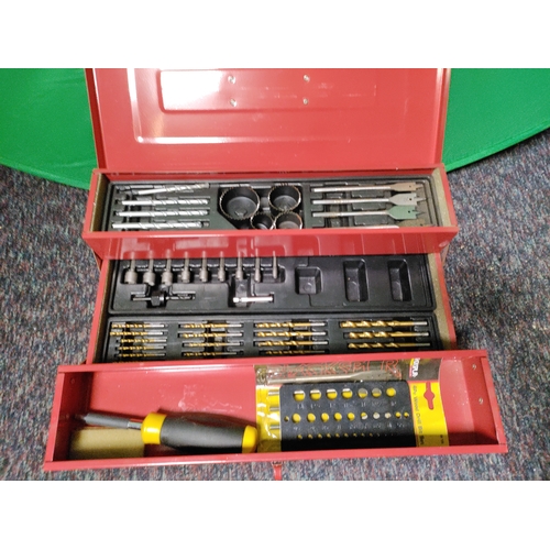 54 - A red metal tool box containing drill bits.(H 17 cm x W 47 cm x  D 21 cm)