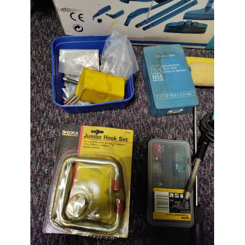 57 - A collection of items from a garage clearance.