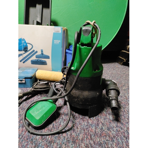 57 - A collection of items from a garage clearance.