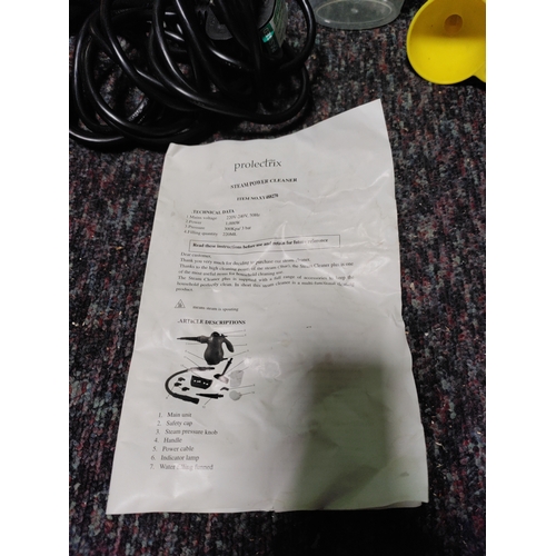 59 - A prolectrix corded steam power cleaner & attachments.