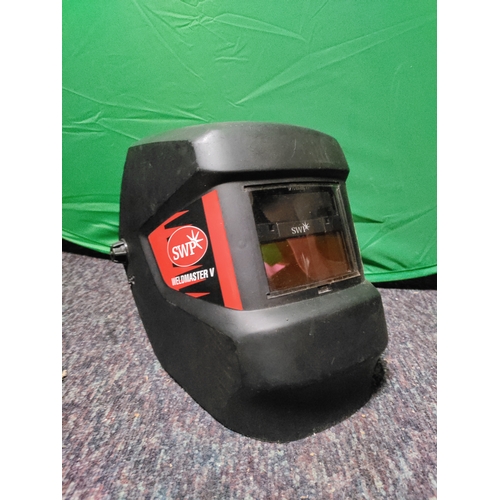 65 - a SIP Migmate 130 welder. To include welding mask & equipment.