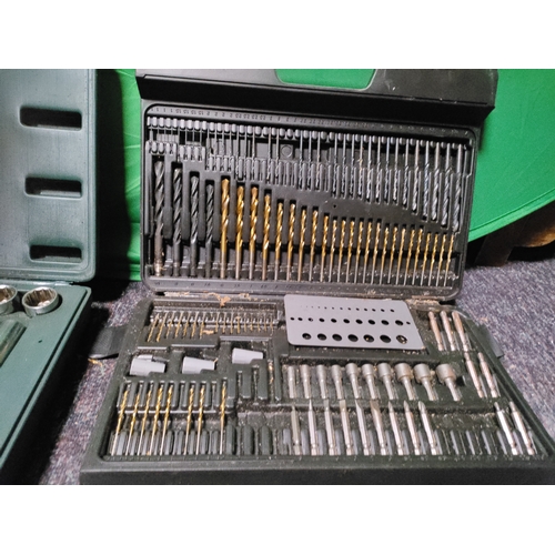 71 - A drill & screwdriver set & a socket set .